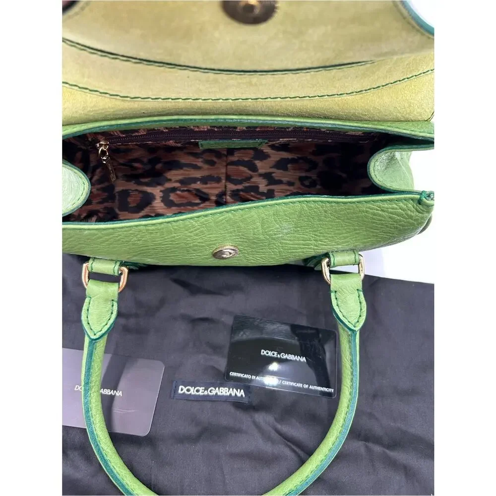 Women's vintage Dolce & Gabanna grainy, leather satchel in neon green made Italy